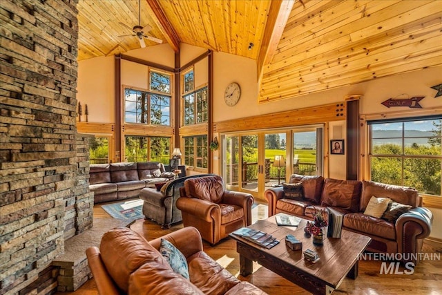 3872 Brookside Dr, New Meadows, ID 83654 - living area with wood ceiling with exposed beams, wood finished floors, high vaulted ceiling, a ceiling fan, and french doors