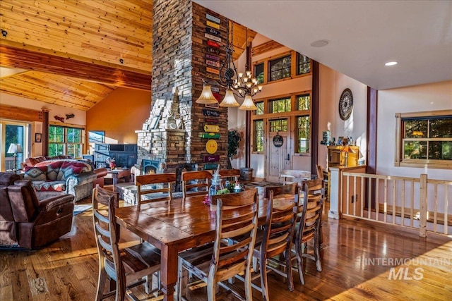 3872 Brookside Dr, New Meadows, ID 83654 - dining room with hardwood / wood-style flooring, a chandelier, healthy amount of natural light, high vaulted ceiling, and beam ceiling