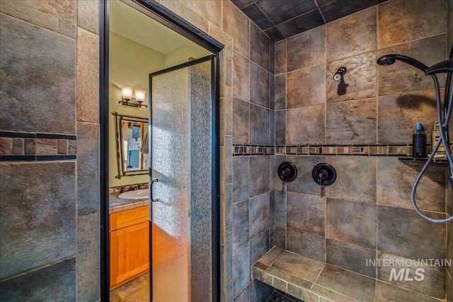 3872 Brookside Dr, New Meadows, ID 83654 - bathroom featuring a tile shower and vanity