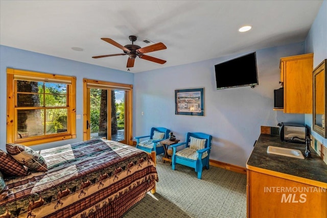 3872 Brookside Dr, New Meadows, ID 83654 - bedroom featuring a sink, access to outside, carpet flooring, baseboards, and ceiling fan