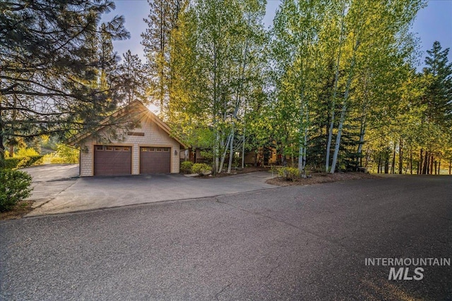 3872 Brookside Dr, New Meadows, ID 83654 - view of front facade with a garage