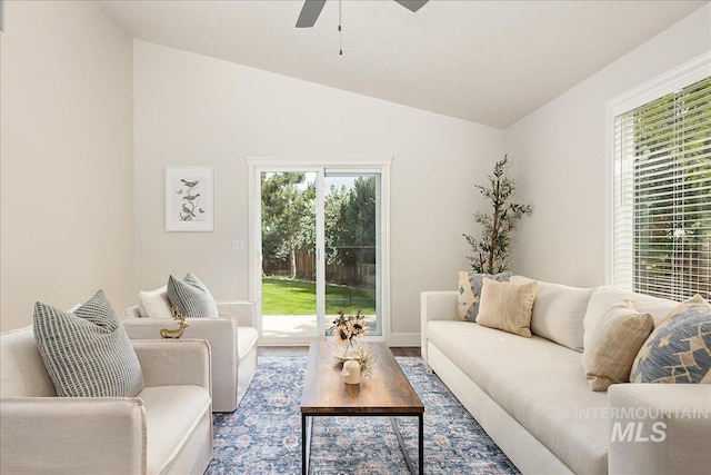 4112 W Cherrytree Ct, Meridian, ID 83642 - living area with vaulted ceiling, ceiling fan, and wood finished floors