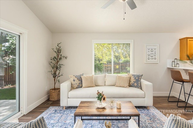 4112 W Cherrytree Ct, Meridian, ID 83642 - living area featuring ceiling fan, baseboards, and dark wood-style flooring