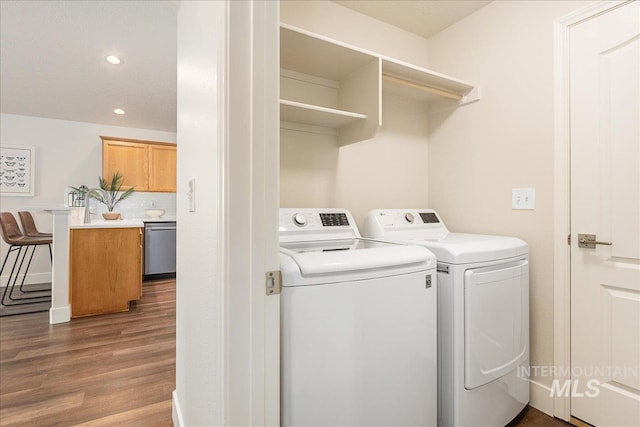 4112 W Cherrytree Ct, Meridian, ID 83642 - clothes washing area with washer and clothes dryer, dark wood-style flooring, and recessed lighting