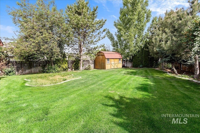 4112 W Cherrytree Ct, Meridian, ID 83642 - view of yard with a storage unit and an outbuilding