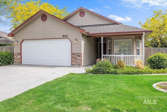 4112 W Cherrytree Ct, Meridian, ID 83642 - ranch-style house with roof with shingles, concrete driveway, stone siding, a garage, and covered porch