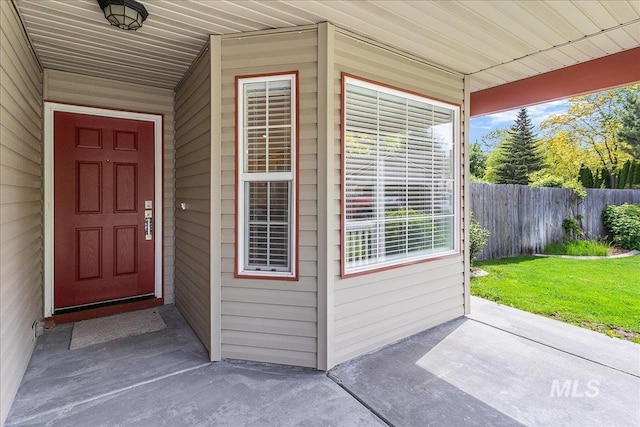 4112 W Cherrytree Ct, Meridian, ID 83642 - property entrance with fence and a patio