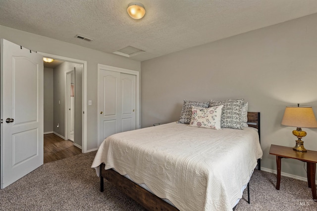 3422 Vistapark Dr, Caldwell, ID 83605 - bedroom featuring carpet floors, attic access, a closet, baseboards, and a textured ceiling