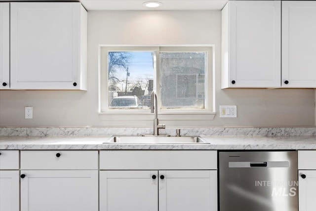 kitchen with a sink, white cabinetry, recessed lighting, and dishwasher