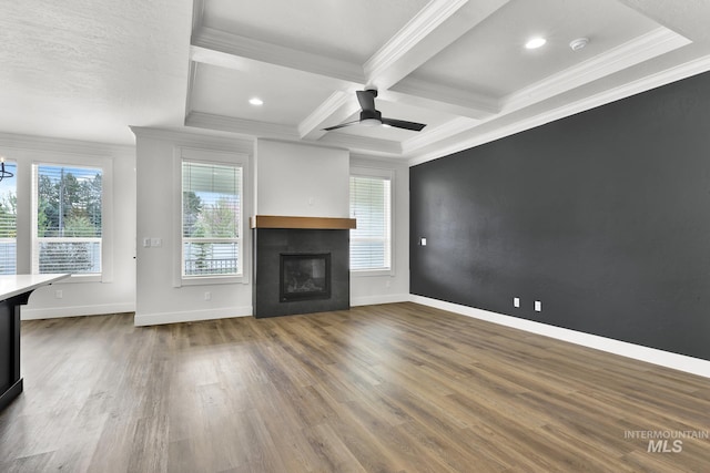 1440 E Azan St, Meridian, ID 83646 - unfurnished living room featuring wood finished floors, a fireplace, baseboards, and ornamental molding