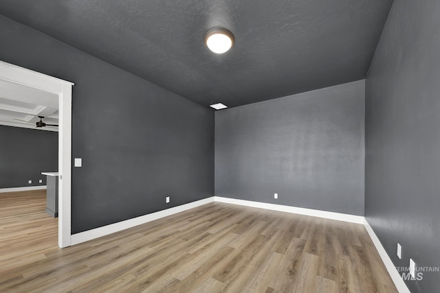 1440 E Azan St, Meridian, ID 83646 - bonus room with ceiling fan, baseboards, a textured ceiling, and wood finished floors