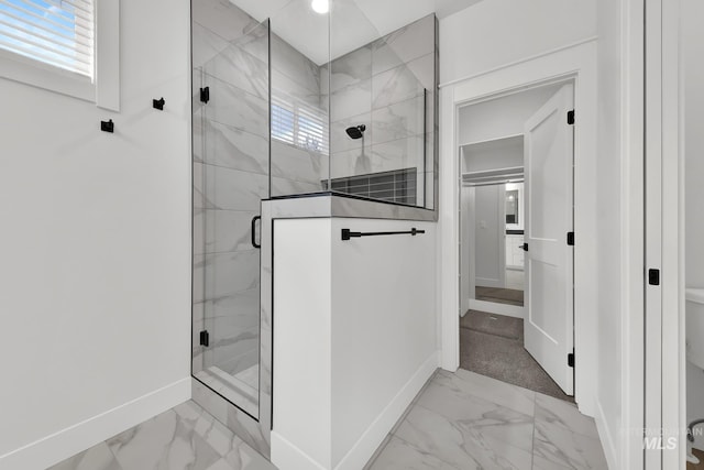 1440 E Azan St, Meridian, ID 83646 - bathroom featuring a stall shower, marble finish floor, and baseboards