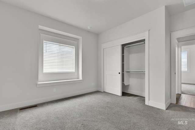 1440 E Azan St, Meridian, ID 83646 - unfurnished bedroom featuring visible vents, baseboards, a closet, and carpet floors