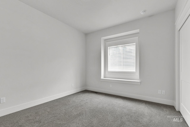 1440 E Azan St, Meridian, ID 83646 - carpeted spare room featuring baseboards