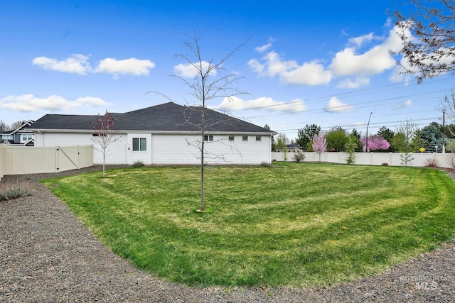 1440 E Azan St, Meridian, ID 83646 - view of yard featuring a fenced backyard and a gate