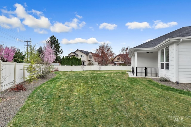 1440 E Azan St, Meridian, ID 83646 - view of yard featuring a fenced backyard and a ceiling fan