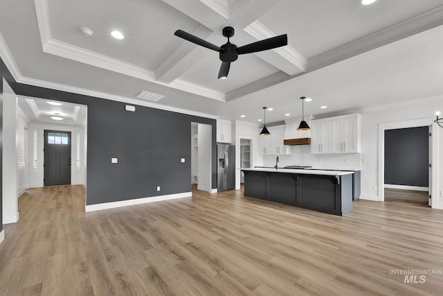 1440 E Azan St, Meridian, ID 83646 - kitchen featuring white cabinets, stainless steel refrigerator with ice dispenser, open floor plan, a ceiling fan, and beamed ceiling