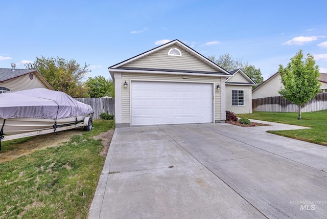 view of front of home featuring a garage and driveway