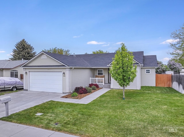ranch-style home featuring an attached garage, driveway, and a shingled roof