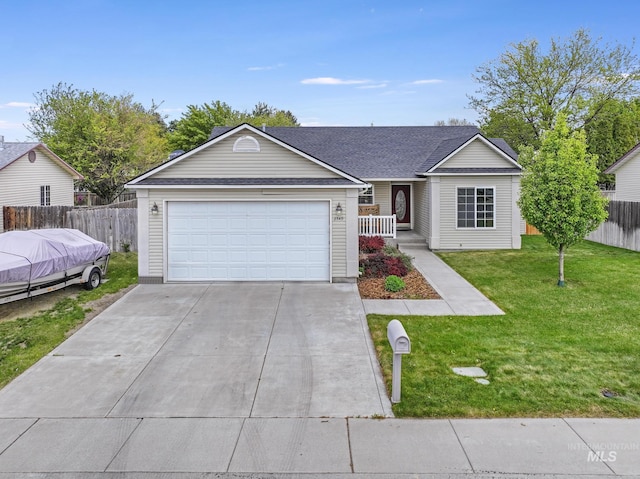 single story home featuring driveway, a garage, and a shingled roof