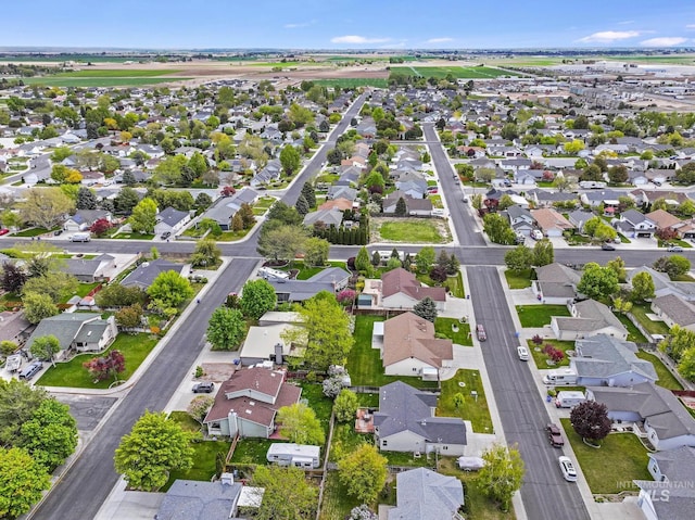 aerial view of property and surrounding area with nearby suburban area
