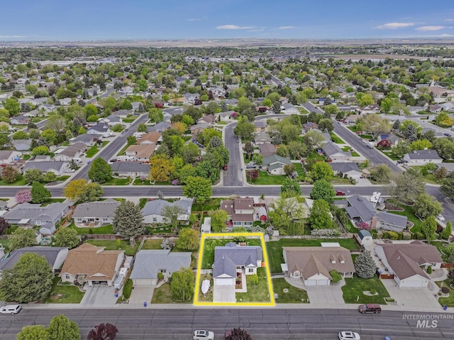 aerial view of residential area with property boundaries highlighted