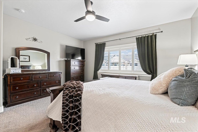 carpeted bedroom featuring ceiling fan