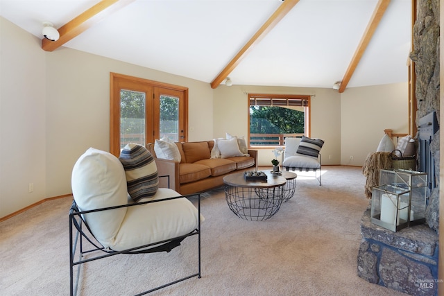 living room featuring baseboards, a healthy amount of sunlight, vaulted ceiling with beams, and carpet flooring