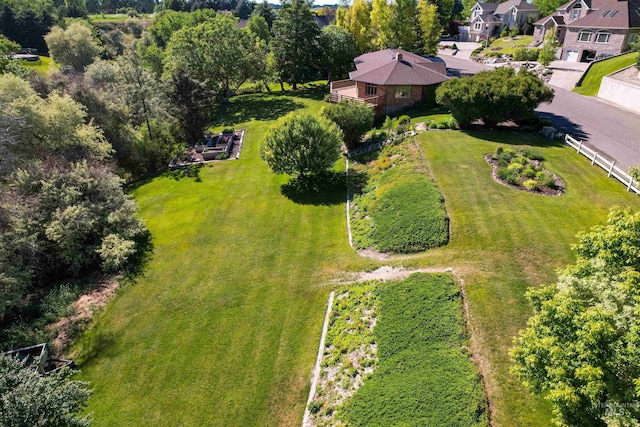 birds eye view of property with a residential view