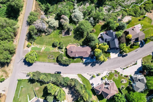 birds eye view of property with a residential view