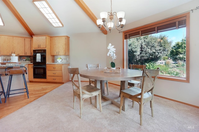 dining area featuring vaulted ceiling with beams, light wood finished floors, baseboards, and a notable chandelier