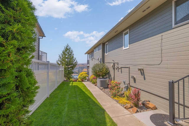 view of yard with central AC