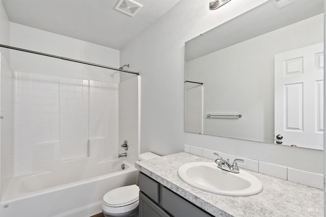 full bath featuring visible vents, vanity, toilet, and shower / tub combination