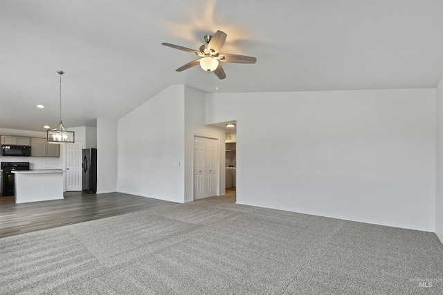 unfurnished living room with recessed lighting, ceiling fan with notable chandelier, high vaulted ceiling, and dark colored carpet