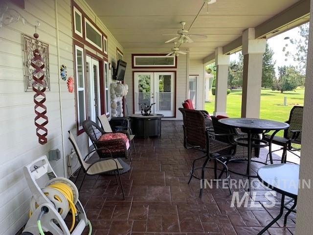 3997 W Harbor Point Dr, Meridian, ID 83646 - view of patio / terrace with french doors and a ceiling fan