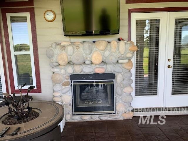 3997 W Harbor Point Dr, Meridian, ID 83646 - detailed view of a fireplace and french doors