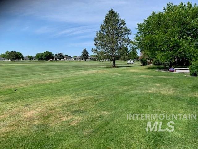 3997 W Harbor Point Dr, Meridian, ID 83646 - view of community featuring a lawn and view of golf course