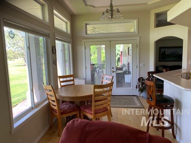 3997 W Harbor Point Dr, Meridian, ID 83646 - dining room with french doors and baseboards