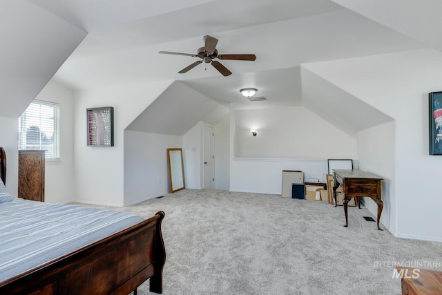 bedroom with vaulted ceiling, carpet, visible vents, and ceiling fan