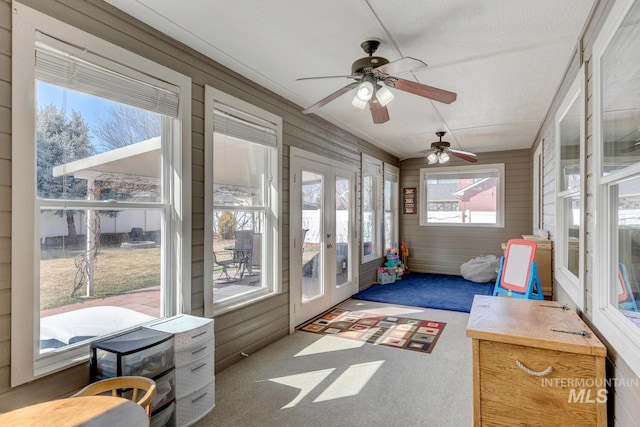 sunroom featuring french doors