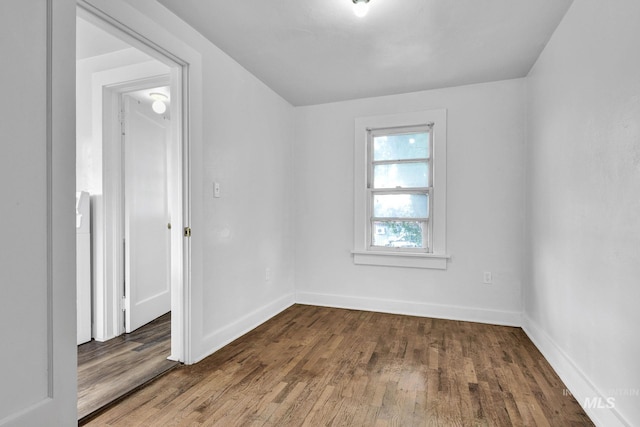 405 N 2nd E, Mountain Home, ID 83647 - empty room featuring wood finished floors and baseboards
