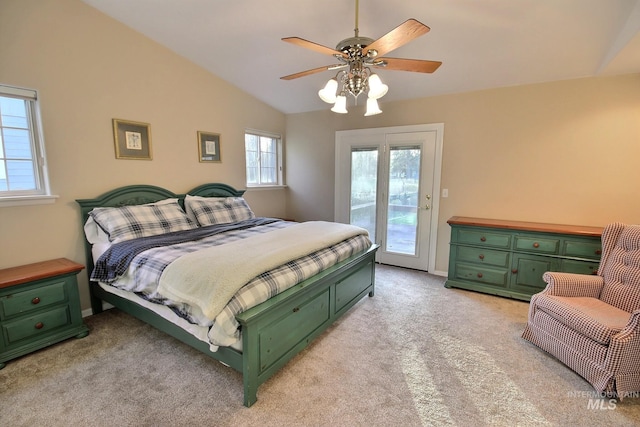 bedroom with access to outside, light colored carpet, ceiling fan, and vaulted ceiling