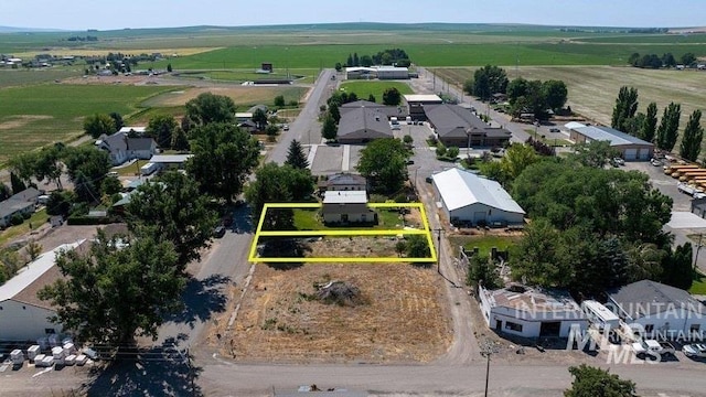 aerial view featuring a residential view and a rural view
