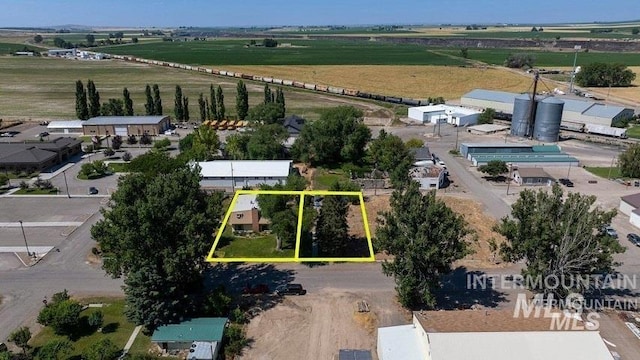 birds eye view of property featuring a rural view