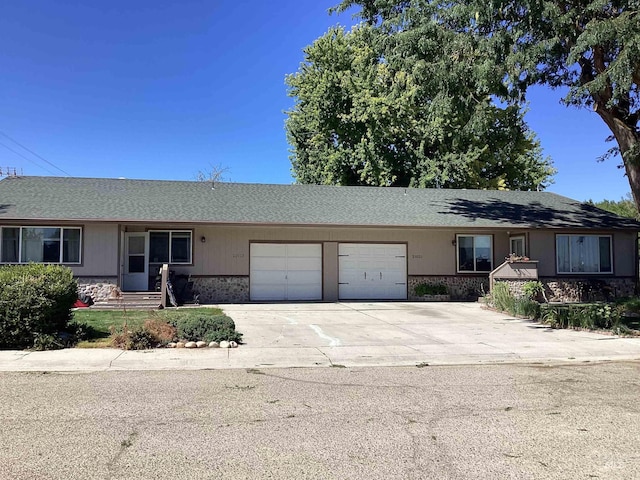 single story home with a garage