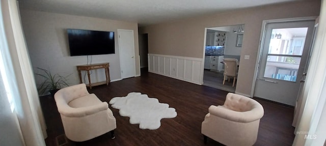 living room featuring dark hardwood / wood-style floors