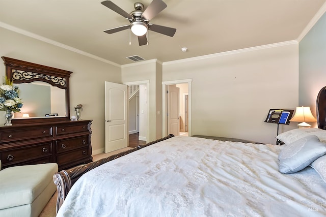 bedroom featuring ceiling fan and ornamental molding