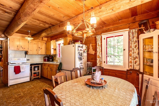 interior space featuring wood ceiling, beamed ceiling, and a chandelier