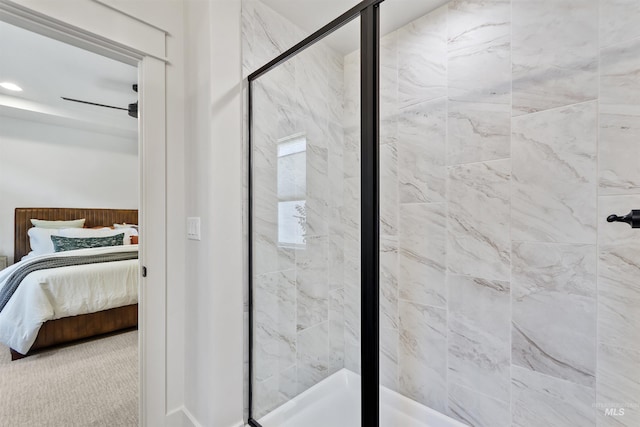 ensuite bathroom featuring ensuite bath and a shower stall