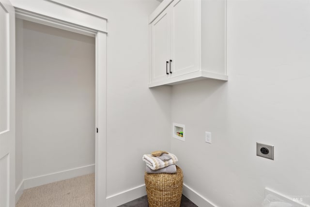 laundry room with cabinet space, baseboards, carpet, washer hookup, and electric dryer hookup